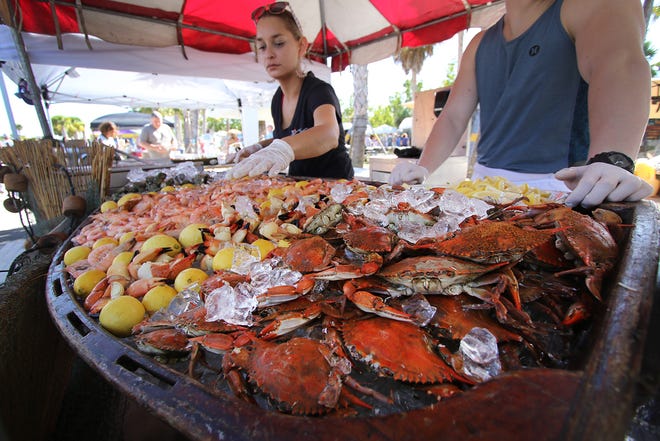 Siesta Beach Seafood & Music Festival, pictured here in 2016, is set to return Dec. 1-3.